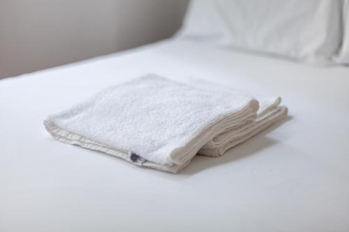 a white towel sitting on top of a counter at Cannon Street Studios in London