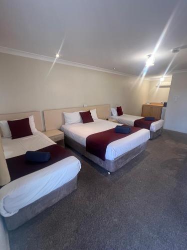 Katil atau katil-katil dalam bilik di OVERLANDER MOTOR LODGE