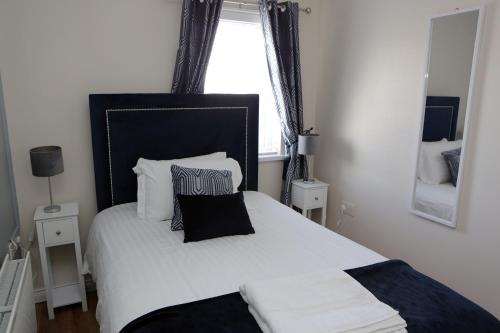 Ένα ή περισσότερα κρεβάτια σε δωμάτιο στο Causeway B&B