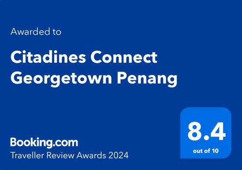 um sinal azul que lê pilhas ligam o penning do verme verde em Citadines Connect Georgetown Penang em George Town