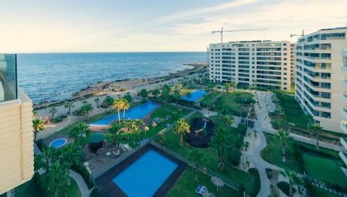Apartamento Premium con Jacuzzi y vistas al mar en Punta Prima, Torrevieja by Rentalole