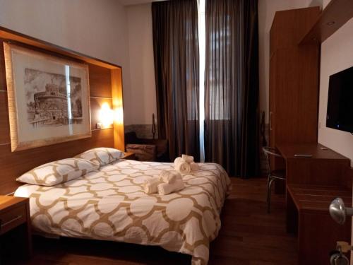 ローマにあるB&B RELAXのホテルルーム ベッド1台(テディベア付)