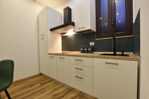 Nhà bếp/bếp nhỏ tại XX Miglia rooms & apartments