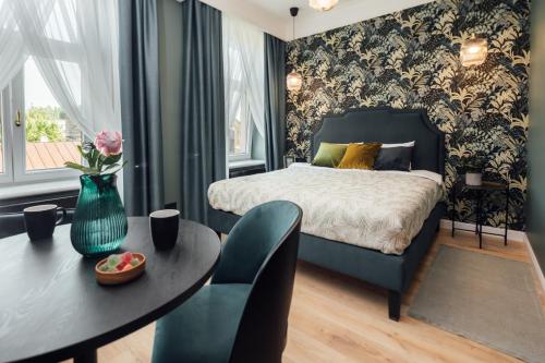Postel nebo postele na pokoji v ubytování Aparthotel Amella