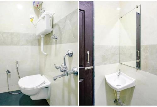 a bathroom with a toilet and a sink at HoteL Namaste London Terminal-2 in Mumbai