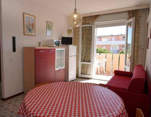 Fotografia z galérie ubytovania Red flat with shared pool and private parking v destinácii Porto Santa Margherita di Caorle