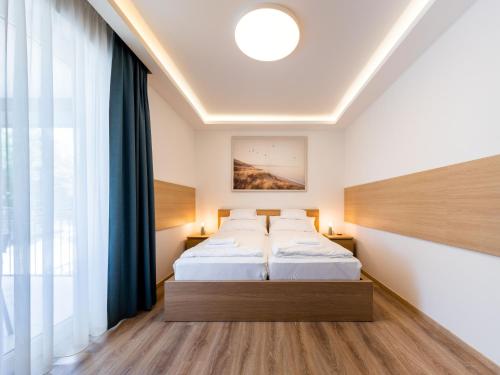 Postel nebo postele na pokoji v ubytování Master Resorts