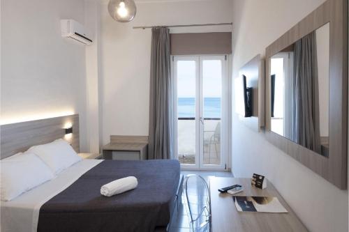 Hotel Tirrenoにあるベッド