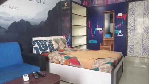 En eller flere senge i et værelse på Aranmagan Paradise
