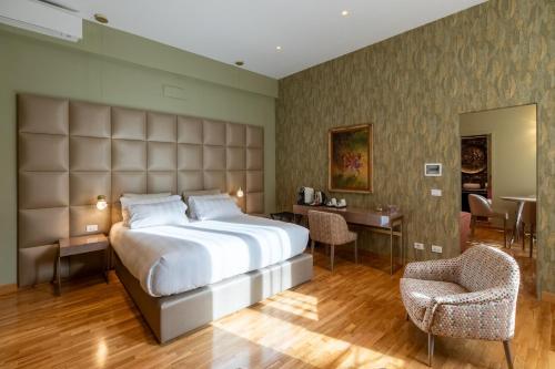 Postel nebo postele na pokoji v ubytování Residenza Pierret