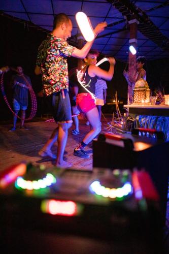 a group of people dancing on a stage at Retac Qunay Dahab Resort & SPA in Dahab