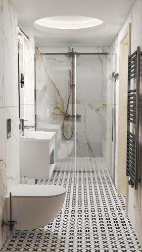 a bathroom with a sink and a shower and a tub at Hotel Savoy Prague in Prague