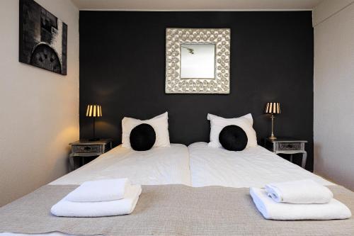 Postel nebo postele na pokoji v ubytování Hotel Berg en Bos