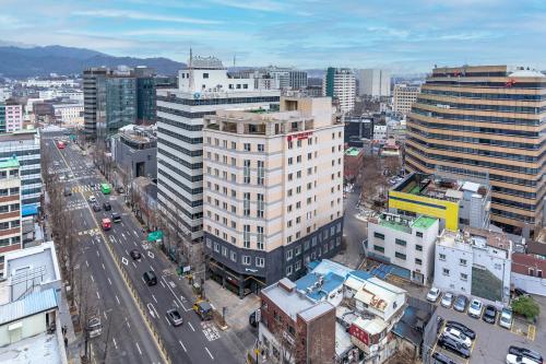 an aerial view of a city with buildings at The Prima Hotel Jongno in Seoul