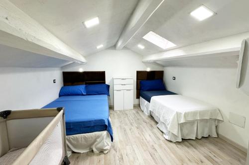 - une chambre avec 2 lits dans l'établissement Bomboniera, à Comacchio