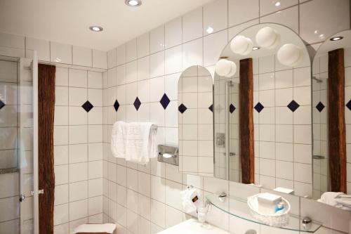 Ванная комната в Schloßhotel Kurfürstliches Amtshaus Dauner Burg