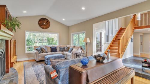 a living room with a couch and a table at Eugene - Close to everything home in Eugene