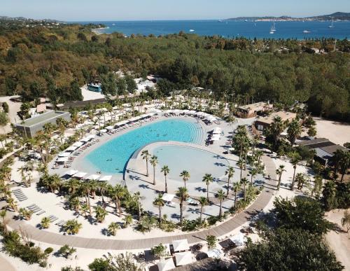 an aerial view of the pool at the resort at Les Prairies de la Mer in Grimaud