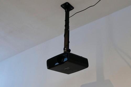 a black light hanging from a ceiling at NG Prestige - Nain I Suite Spa Privatif Premium I Jacuzzi - Sauna - Netflix - Projecteur in Roubaix