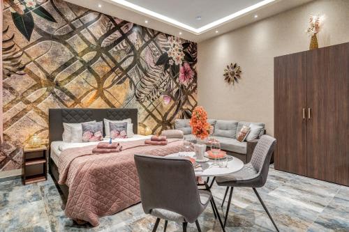 En eller flere senge i et værelse på Budapest Magic Exotic in Downtown