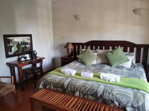 Katil atau katil-katil dalam bilik di Sanloo manor guesthouse