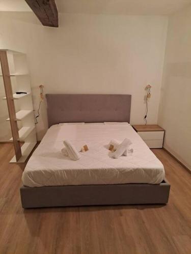 Cama ou camas em um quarto em Borgo Guazzo 24