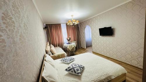 Katil atau katil-katil dalam bilik di Apartment Near The Aquapark