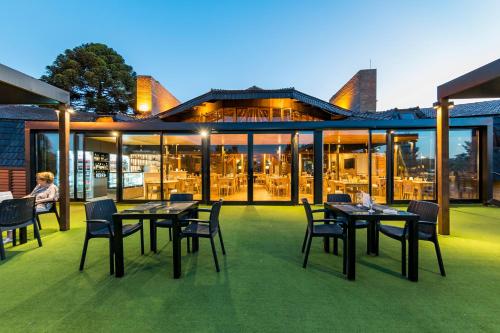 Restoran atau tempat lain untuk makan di Portal del Lago Hotel