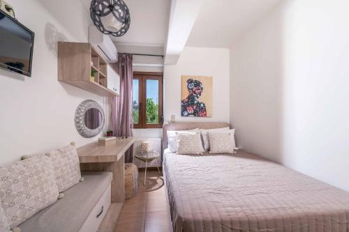 Ένα ή περισσότερα κρεβάτια σε δωμάτιο στο Villa Tresor
