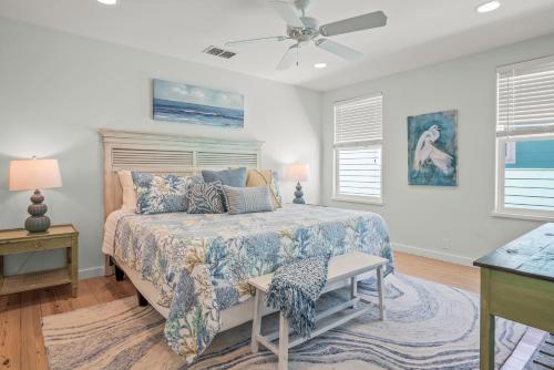 Ένα ή περισσότερα κρεβάτια σε δωμάτιο στο Barefoot Bungalow