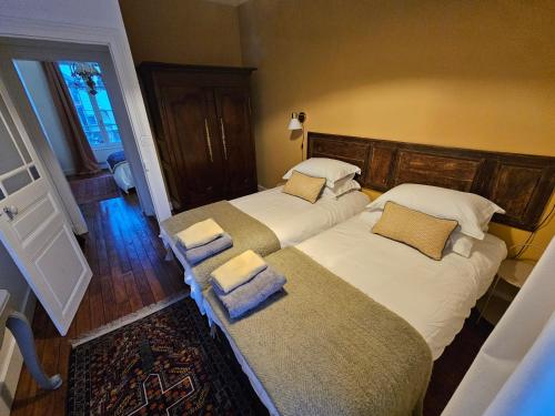 Кровать или кровати в номере Le Germain
