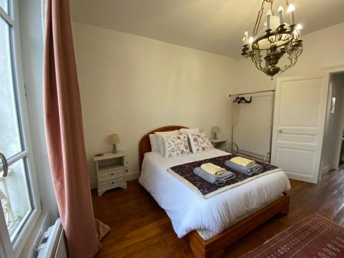 Кровать или кровати в номере Le Germain