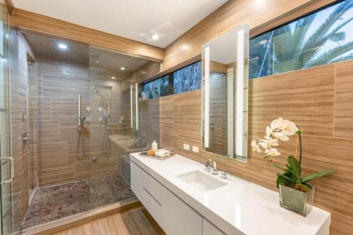 a bathroom with a sink and a shower at Villa Celine in Fort Lauderdale