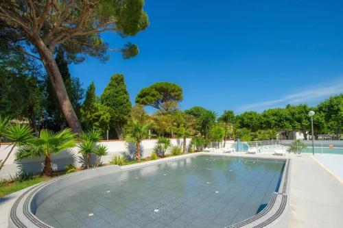 Φωτογραφία από το άλμπουμ του Mobil Home climatisé 3 chambres - Parc des 7 fonts σε Agde