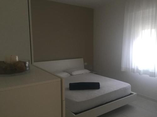 Postel nebo postele na pokoji v ubytování Apartment Mare Caorle int 1