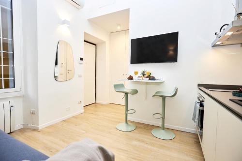 Suite Sanzio 14 - monolocale vicino a Fiera Milano City e Stadio