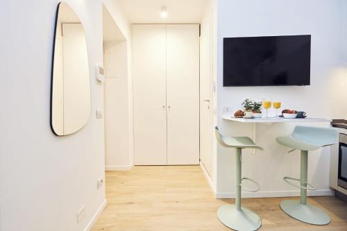 Suite Sanzio 14 - monolocale vicino a Fiera Milano City e Stadio