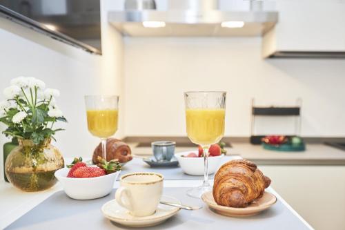 Suite Sanzio 14 - monolocale vicino a Fiera Milano City e Stadio