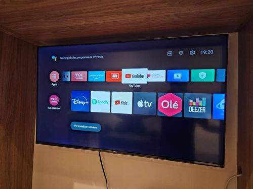 a television screen with a bunch of apps on it at monoambiente completo y central in Santa Cruz de la Sierra