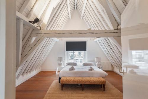 Katil atau katil-katil dalam bilik di Spaarne Luxury Residence Haarlem