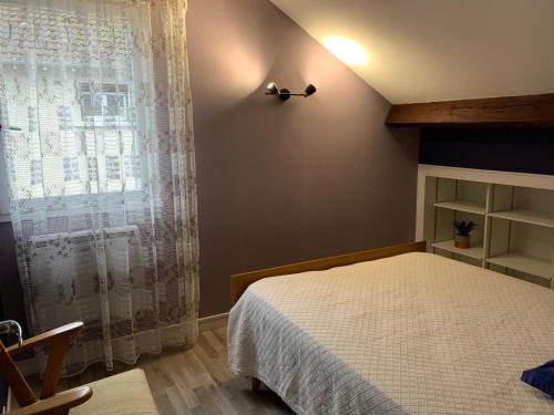 Postel nebo postele na pokoji v ubytování gite la maison16