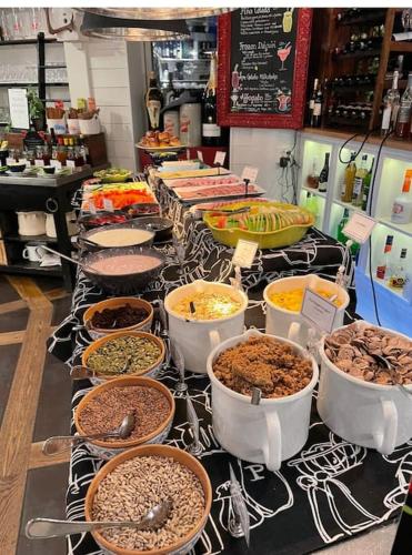 a buffet of different types of food on a table at Bagargården 8 in Åre