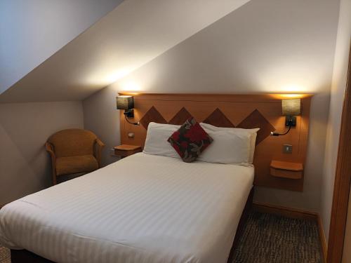 Postel nebo postele na pokoji v ubytování Corn Mill Lodge Hotel