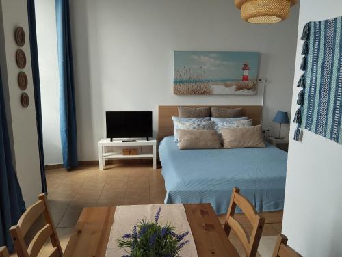 Μια τηλεόραση ή/και κέντρο ψυχαγωγίας στο Aegina Port Apt 3
