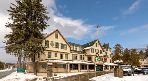 a large building with a flag on top of it at The Wentworth in Jackson