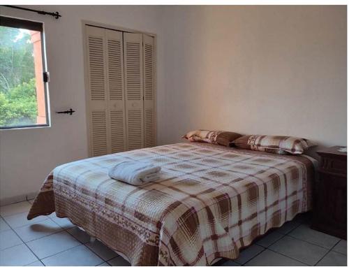 Postel nebo postele na pokoji v ubytování Departamento acogedor Hotel-Condominio Buganvillas