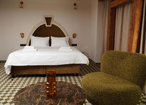 เตียงในห้องที่ Hotel Pietryna
