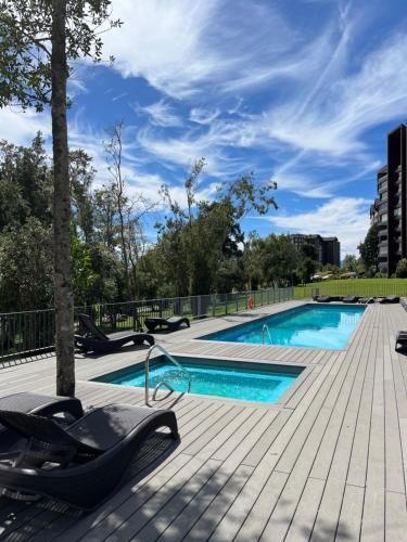 Bazén v ubytování Departamento La Puntilla de Villarrica Orilla Lago nebo v jeho okolí