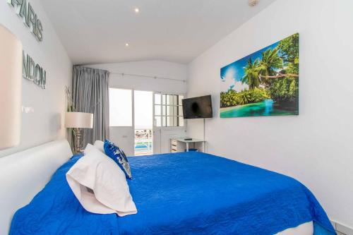 Ένα ή περισσότερα κρεβάτια σε δωμάτιο στο Villa Venecia