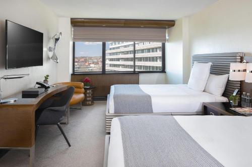 Katil atau katil-katil dalam bilik di The Watergate Hotel Georgetown